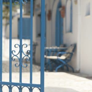 Blue Owatrol Deco applied to a metal gate