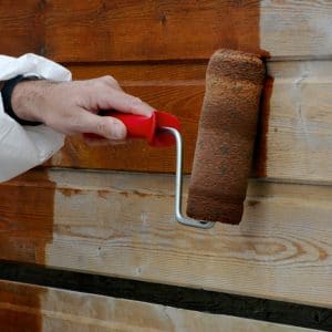 Textrol being applied to wood