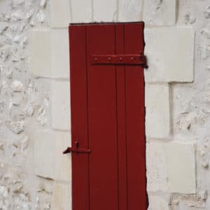 AP60 in red applied to wooden door