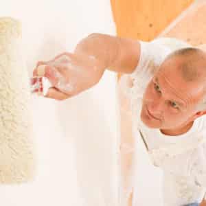 Man painting a wall