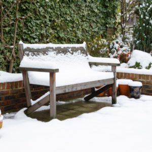 Garden bench in the snow