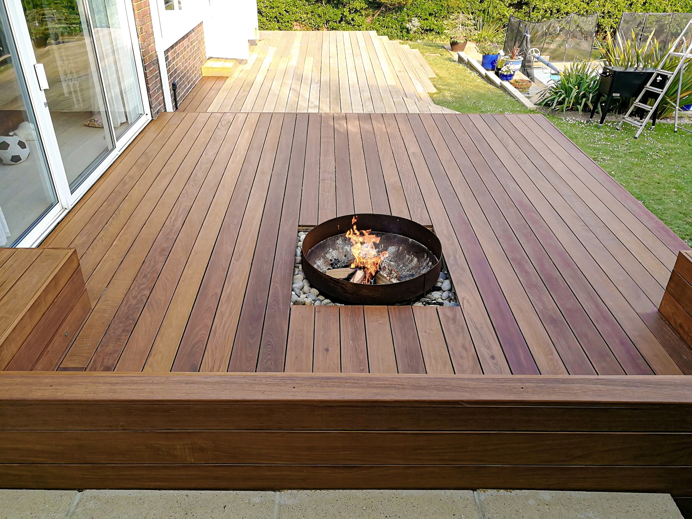 Aquadecks applied to deck with firepit