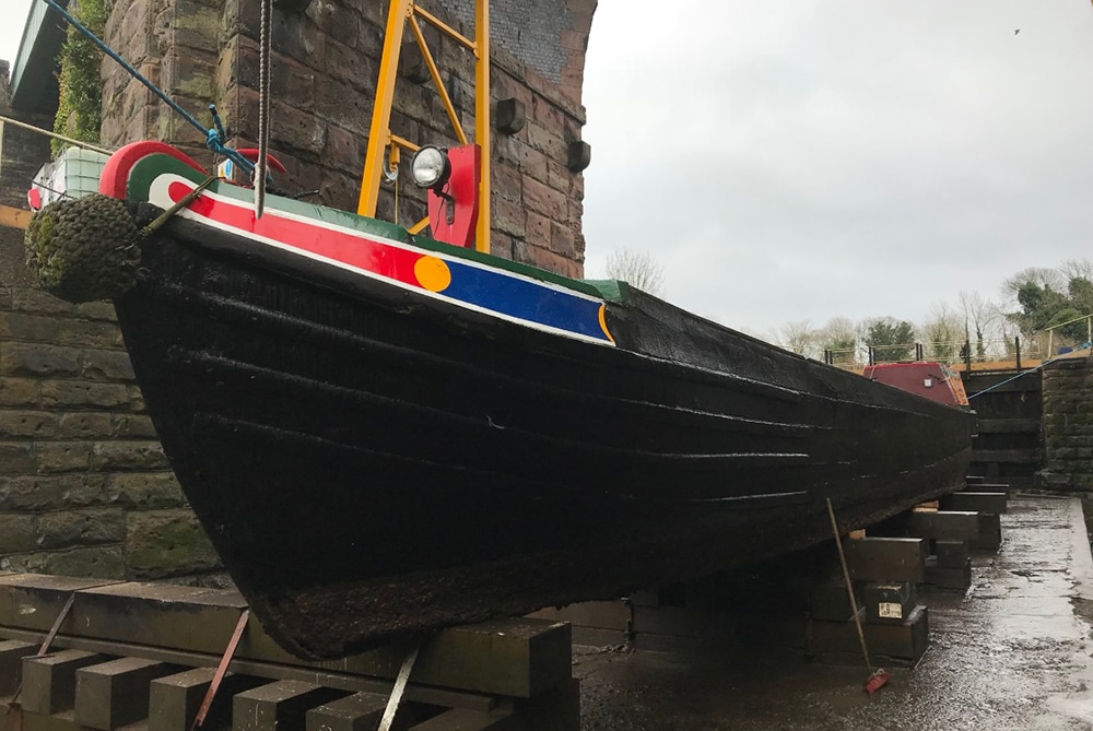 boat hull blacking in progress