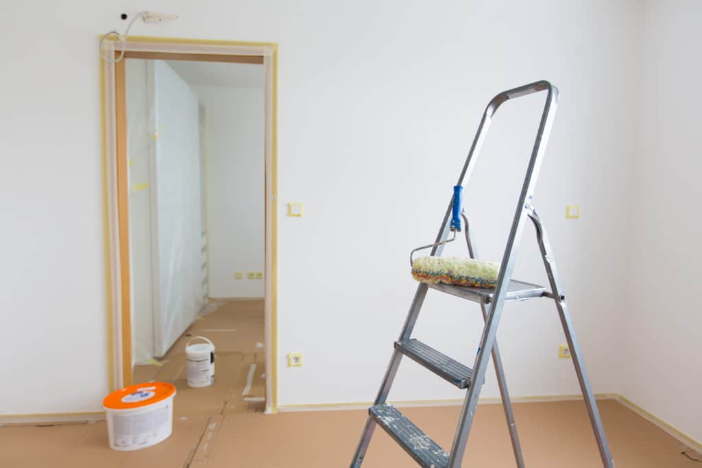 Interior door frame with masking tape