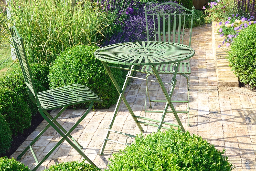 Metal table and chairs in a garden